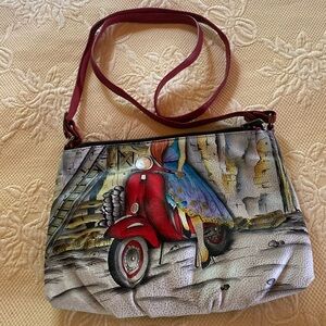 Hand painted Anuschka “scooter” cross body handbag